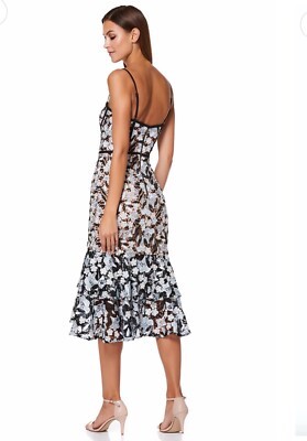 jojo midi dress Our Stunning Midi JoJo Dress is a classic in the Black silk with golden spots. Libelula