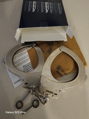 New Smith & Wesson Model M110-1 Nickel Handcuffs w/ 2 Keys