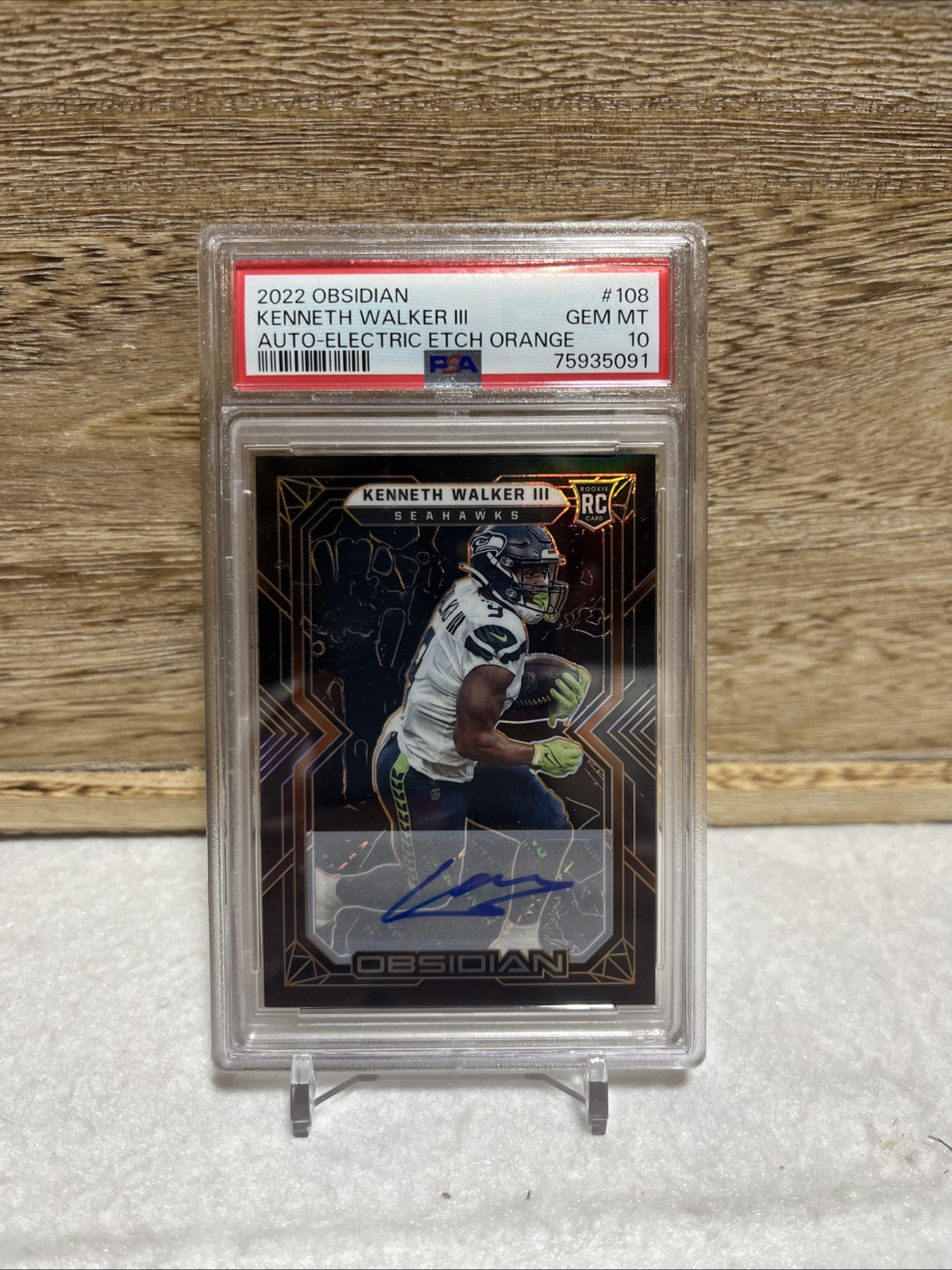 Kenneth Walker III Panini Obsidian #108 Autograph-Electric Etch Orange