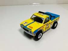 AUTO WORLD  1975 DATSUN 620 PICK UP  7  NEW  for AFX, AURORA , TYCO, HO