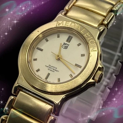[EXC] Ricoh Medallion 505045 montre à quartz pour femmes cadran ivoire ton or... - Photo 1/4