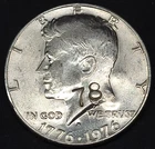 1976D Bicentennial Kennedy Half Dollar coin -- Counter-stamped 33/45/78