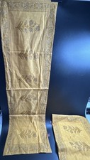 Set of 8 placemats and table runner from India. Gold with metalic thread.