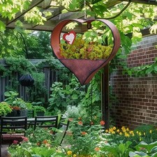 Maceta colgante en forma de corazón cesta de plantas cerca florero maceta