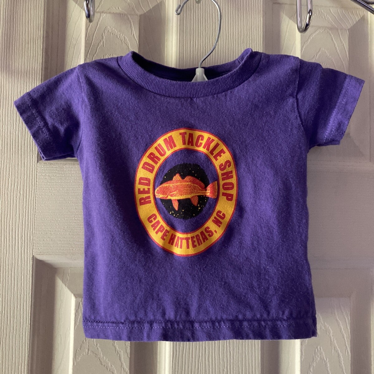 “RED DRUM TACKLE SHOP” CAPE HATTERAS NC INFANT SZ 12 Mo PURPLE SS T SHIRT