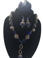 Mojisola Adeola Gbadamosi-Sanni Jewelry Purple Blue Set. 