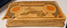 Vintage egg slicer.  Aluminium in original box. Over 80 years old.
