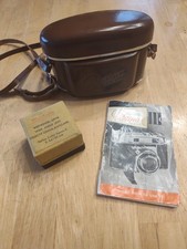 Kodak Retina lll c camera with 2 Schneider lenses, leather case, owner's manual.