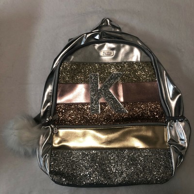 justice bookbags with the letter k