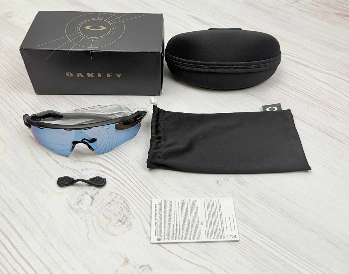 Oakley OO9208-5538 Black Plastic Frame with Blue Polarized