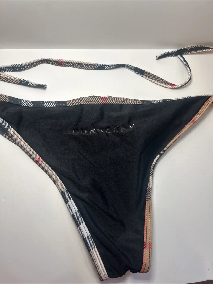 Parte inferior de bikini Burberry con tanga a cuadros grande, frente naranja y espalda negra Foto 2 de 4