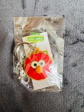 Dije de goma Elmo Donut Sesame Street Mar…