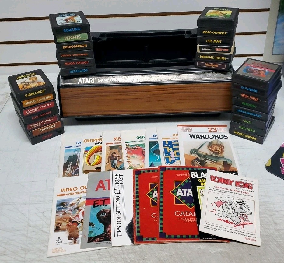 Atari Game Center Storage Unit w/27 Games & Some Manuals - Tested/Works *READ*