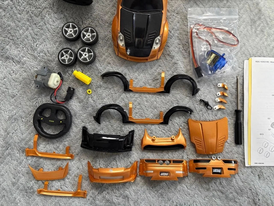 Xmods 2004 Nissan 350z Copper Orange 1:28 w/ Light & Body Kit Extras - Image 2 of 4