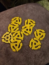 VINTAGE YELLOW PLASTIC 45 RPM 7" INSERT RECORD TURNTABLE ADAPTER PUSH UP IN