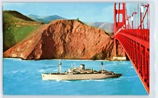 USS Fred C. Ainsworth (TAP 181) passing Golden Gate Bridge (1970)