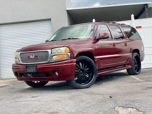 2002 GMC Yukon Denali Sport Utility 4D - Picture 2 of 12