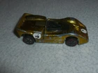VINTAGE HOTWHEELS REDLINE METALLIC GOLD MCLAREN M6A 1969 RED LINE 6255 MATTEL