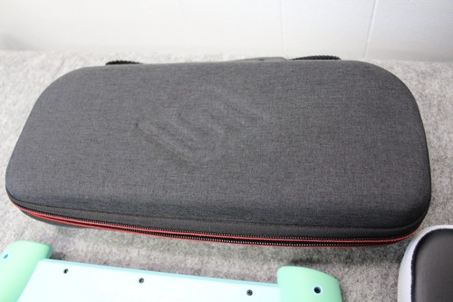 Nintendo Switch Modelo OLED HEG-001 con Empuñadura Satisfye y Estuche - Propiedad de Adultos - Imagen 5 de 10