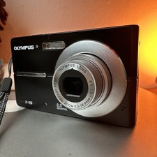 Olympus X-15 Digital Camera turns on but lens is stuck