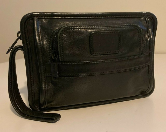 tumi clutch bag