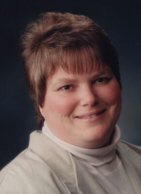 1990s Pretty Woman Smiling Short Brown Hair Studio Portrait