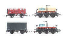 LIMA/ HORNBY/ BACHMANN 'OO' GAUGE RAKE OF 4 ASSORTED TANK/ PLANK & VENT WAGONS