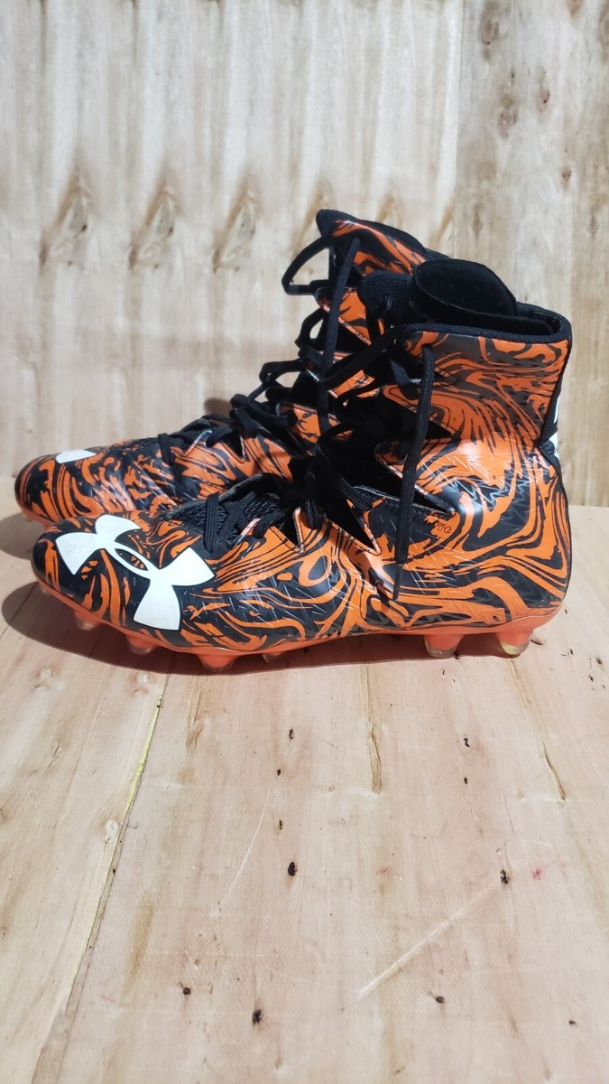 orange and black football cleats youth