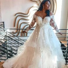 A-Line Wedding Dress Long Sleeve V-Neck Lace Applique Tulle Ruffles Floor Length