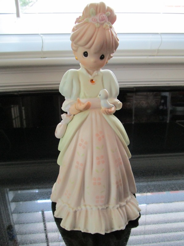 1997 Precious Moment Figurine, Charity begins in the Heart