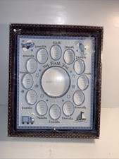NEW BLUE BABY ESSENTIALS PHOTO FRAME HOLDS 13 PICTURES  FIRST YEAR