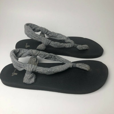 black cloth flip flops