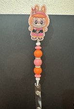 Beaded name badge holder. Retractable.