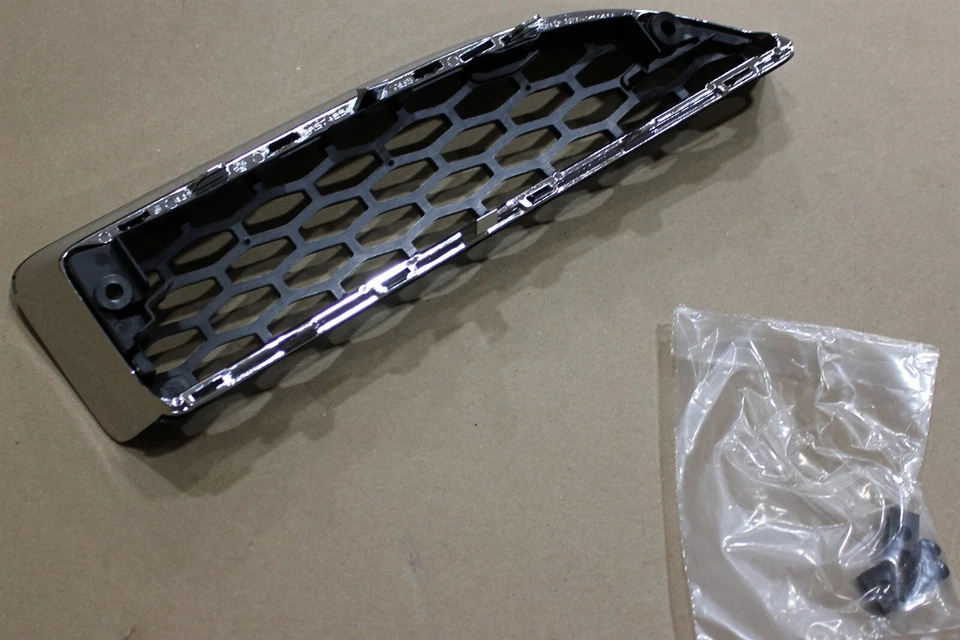 03-05 Dodge Stratus cupé rejilla radiador MN133277 inferior izquierda Mopar OEM Foto 2 de 4