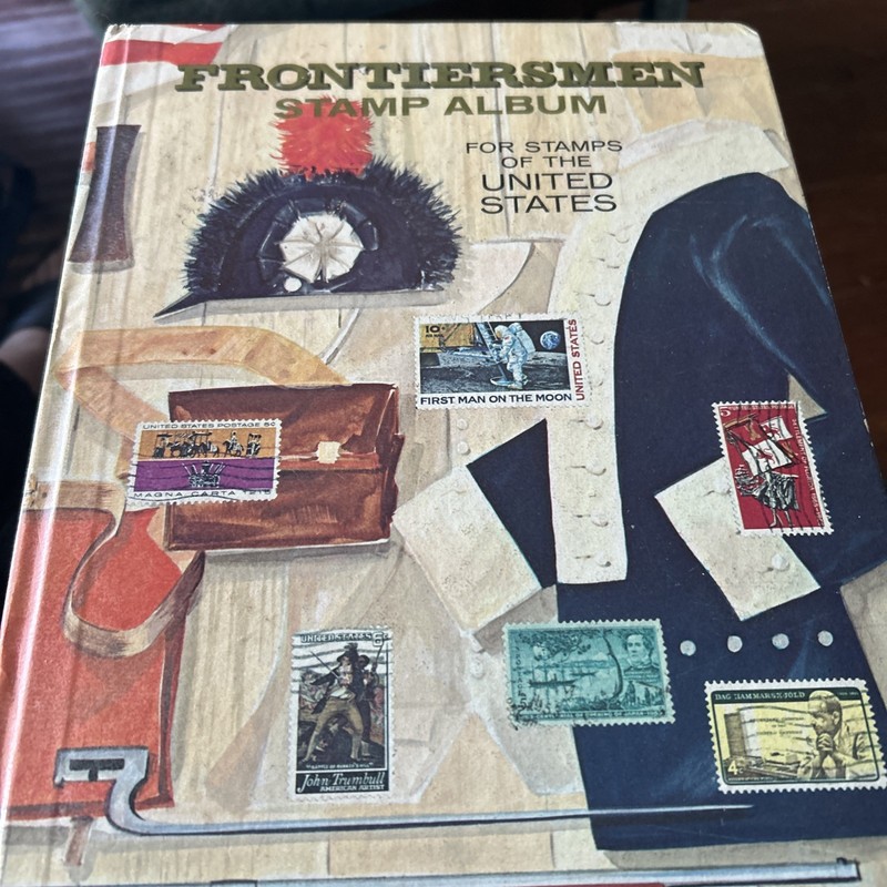 Frontiers Men Stamp Album With Many Stamps