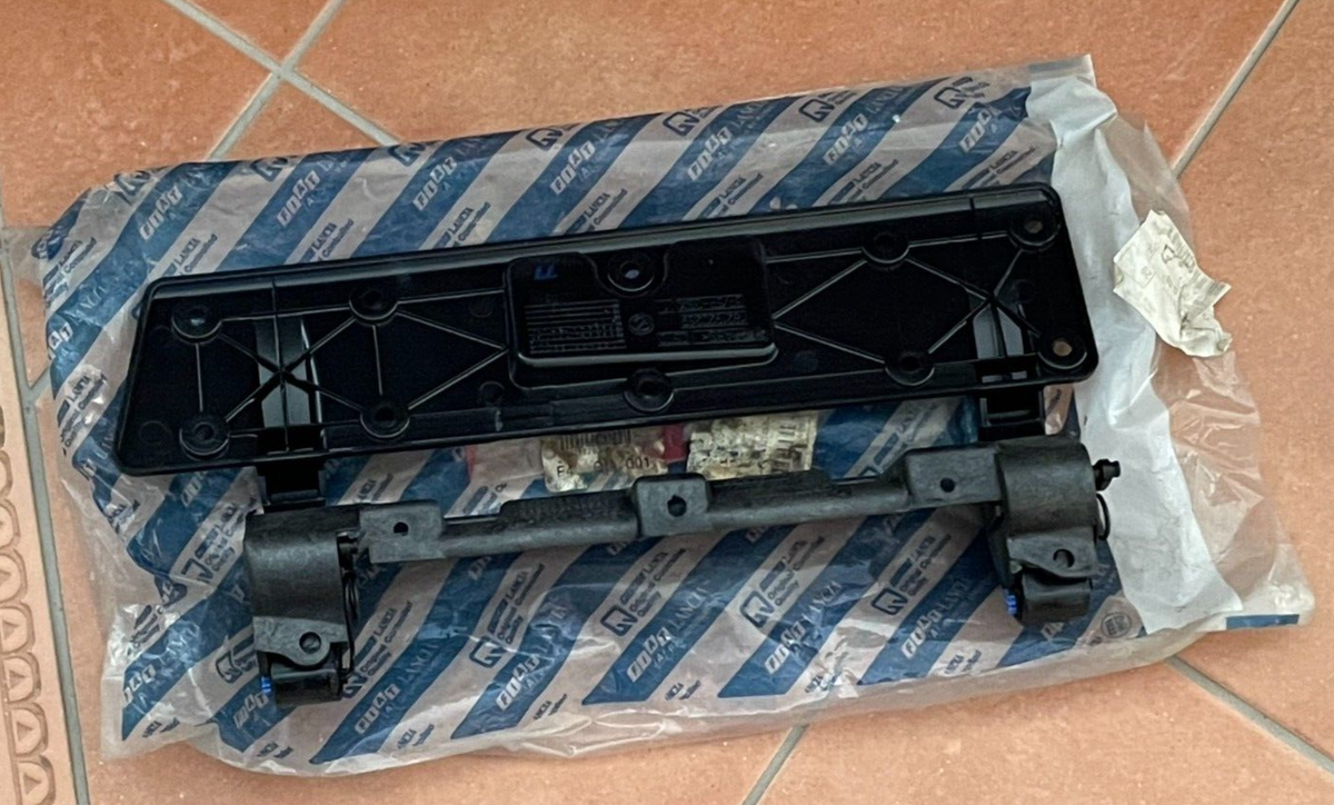 NOS FIAT Tipo glove compartment door mount 71728346 NEW ORIGINAL