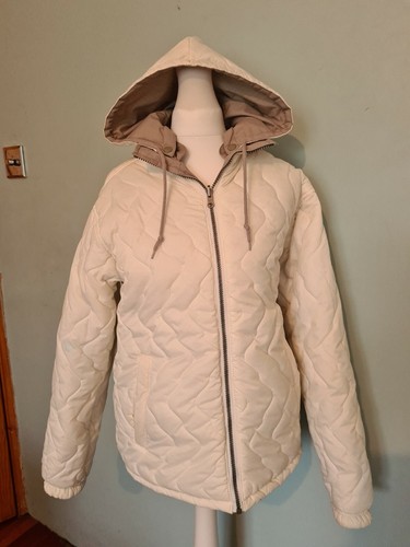 cream nike coat