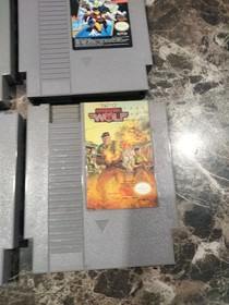 Lote de 8 juegos Nintendo NES TMNT Operation Wolf X-Men Off Road Batman Rambo y m&aacute;s