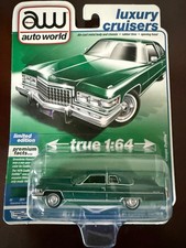 AUTO WORLD 1975 CADILLAC COUPE DEVILLE - Greenbrier Firemist - New