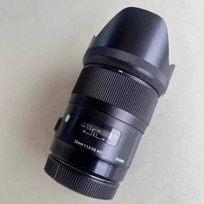 Sigma 35mm f/1.4 DG HSM Art lens  Canon EF Mount Black Good Condition   Used