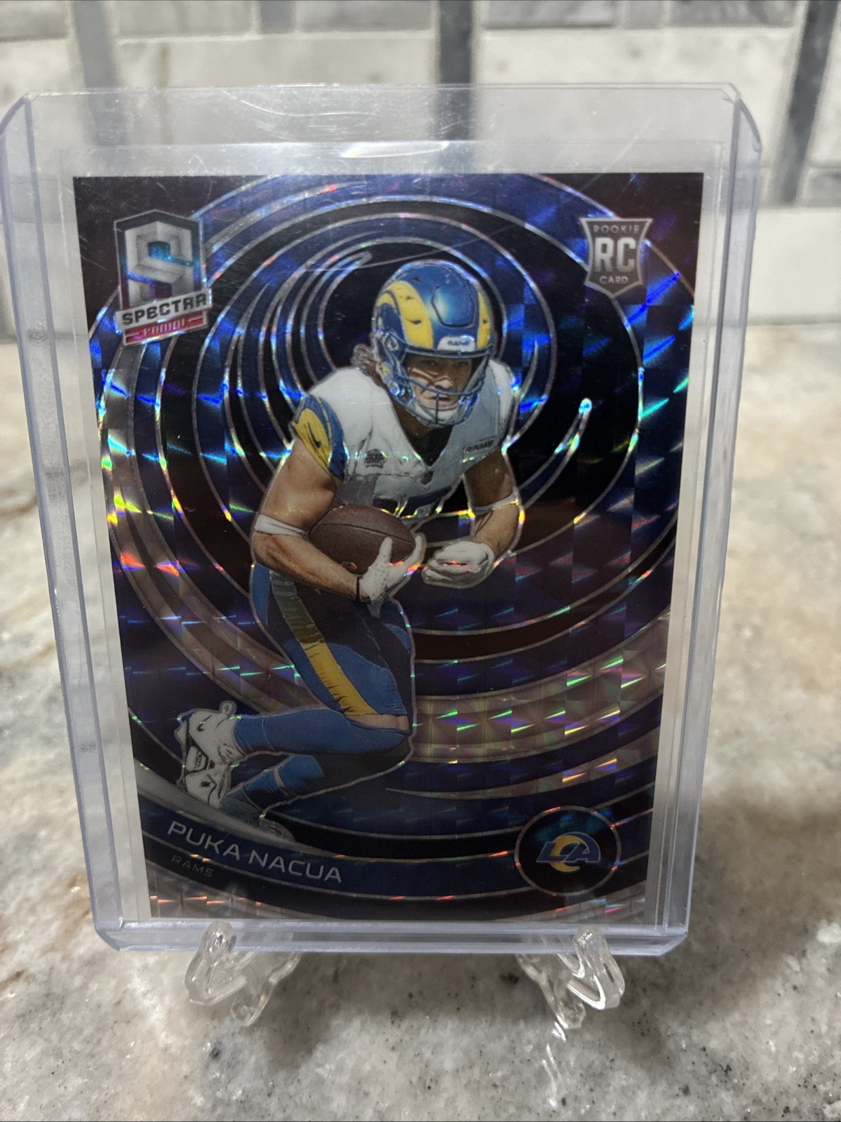 2023 Panini Spectra - Rookies Puka Nacua #189 Interstellar Prizm /60 (RC)