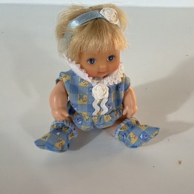 5  Tiny Baby Girl, Push her Back Button and she Moves her little Arms