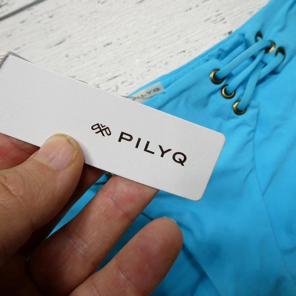 Parte inferior de bikini PilyQ para mujer pequeña azul con cordones calzoncillos de baño traje de playa Foto 2 de 4