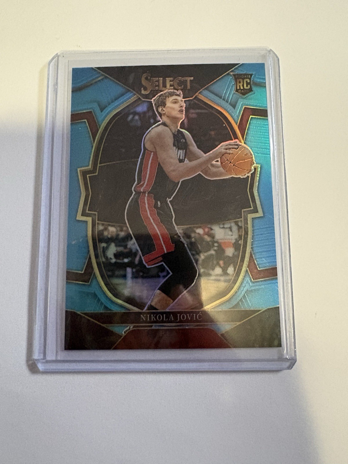 2022-23 Panini Select #91 Nikola Jovic Light Blue Prizms #/299