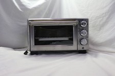 Oster Stainless Steel 4-Slice Toaster Oven   Bake Broil Toast Warm, Works