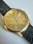 Seiko Men's Vintage Day/Date Gold Tone Quartz Watch 7N43-9048. Working