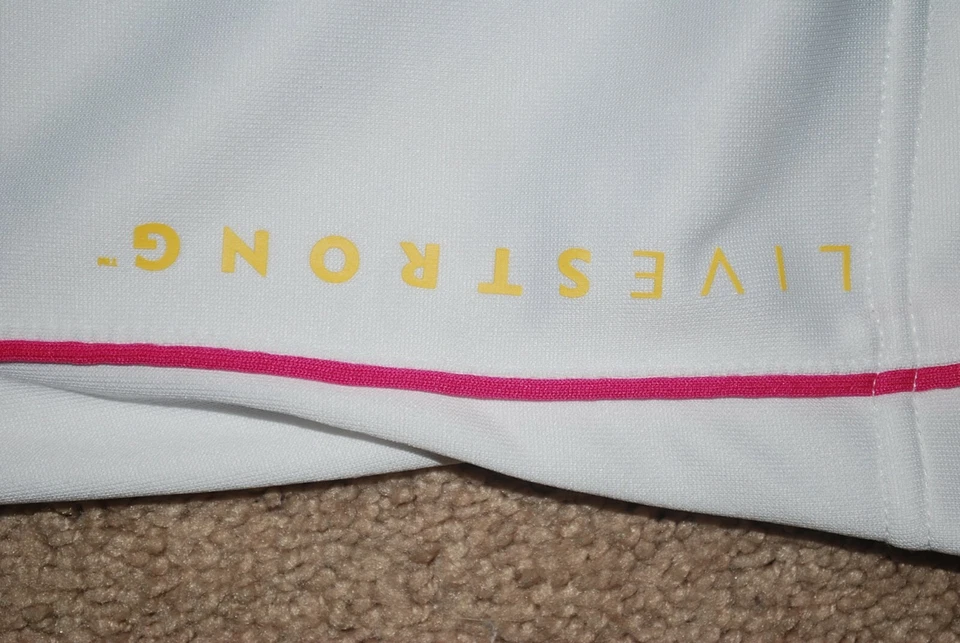 Medias capri para correr blancas Nike DriFit LIVESTRONG para mujer (pequeñas) Foto 3 de 4