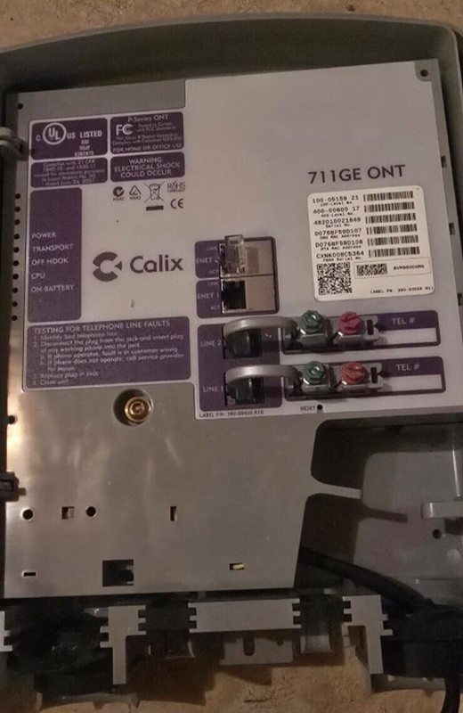 Calix -USED- 711GE ONT, 2 POTS, 2 GE -CE w/ Precision Power PP36PB-12B 36W 12V