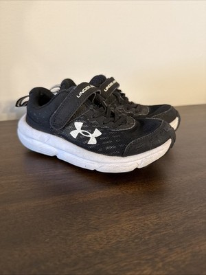 Under Armour UA BPS Assert 9 Black/White Boy's slip on Sneakers Strap Size 12K 