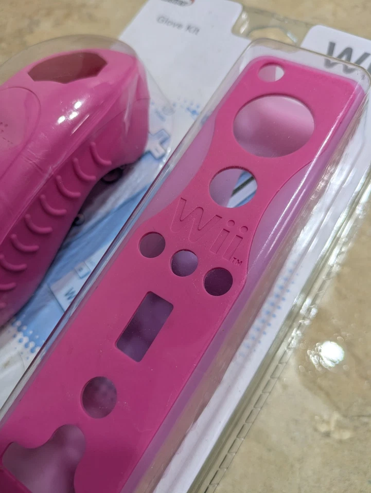 Kit de guantes rosa OEM Nintendo Wii Switch 'N Carry Remote Nunchuck Silcone Foto 2 de 4